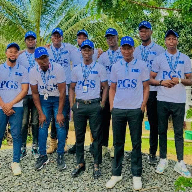 The PGS survey team in branded uniforms and caps